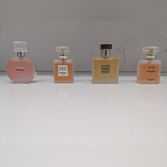 CHANEL Other - Chanel 4 mini perfumes .88 fl oz
